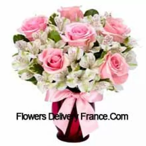 Pink Roses And White Alstroemeria Arrannged Beautifully In A Glass Vase