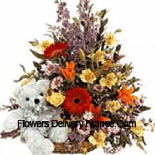 Basket Of Assorted Flowers With A Cute Teddy Bear