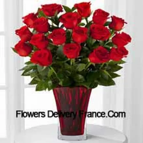 19 Red Roses With Seasonal Fillers In A Glass Vase Decorated With A Pink Bow